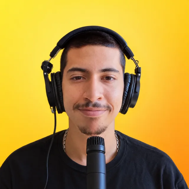 Alejandro, founder of Webzite Studio, in headphones at a studio microphone